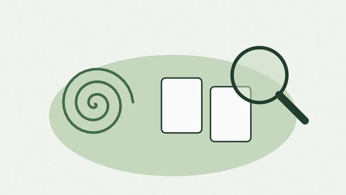 Une spirale verte dessinée à côté de deux cartes et d'une loupe